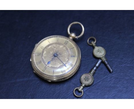 A HALLMARKED 18 CARAT GOLD OPEN FACED MANUAL WIND POCKET WATCH, with two keys, Dia 4 cm