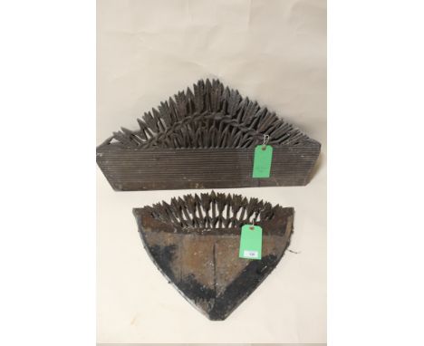 TWO ANTIQUE CARVED HARDWOOD PLAQUES, with pierced arrow shaped detail, largest H 38 cm, W 79 cm, smallest H 45 cm, W 52 cm