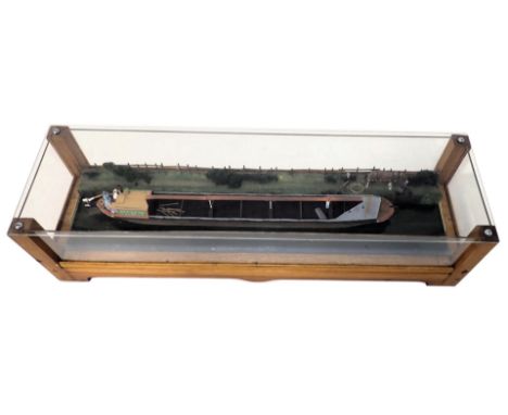 A scale model of a canal boat or barge, The Enid, owned by a William R Fox of Nuneaton, polychrome decorated with realistic s