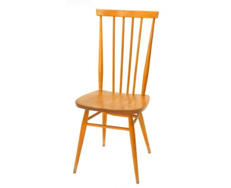 An Ercol pale coloured spindle back kitchen chair, with an elm seat, label to reverse. 