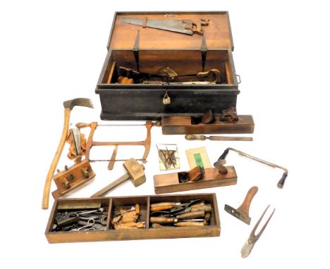 A 19thC black painted pine ships carpenter's tool chest and contents, to include wood block planes, a miniature plane, chisel