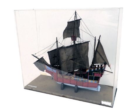 A scale model of the three masted ship The Santa Maria, painted in red, blue and gold, in fitted perspex case, 66cm wide. 