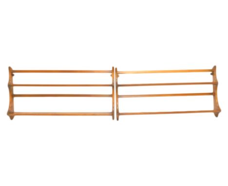 A pair of Ercol elm plate racks, each with two graduated tiers, 50cm high, 96cm wide.