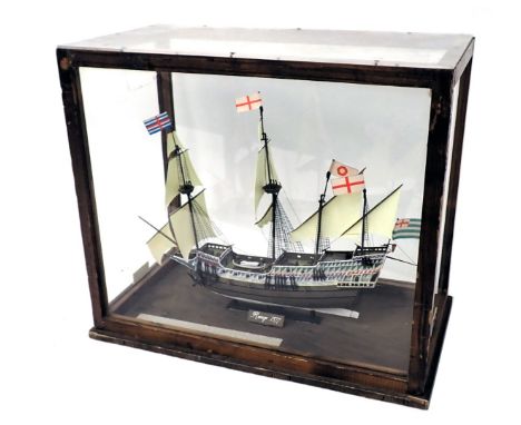 A scale model of Elizabethan galleon The Revenge, polychrome decorated, in stained pine and perspex case, 49cm wide. 