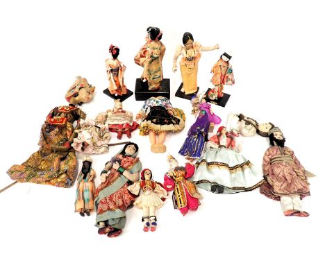 A quantity of mainly Eastern costume dolls, to include Japanese dolls, musical doll with ceramic head and hands, etc., a Thai