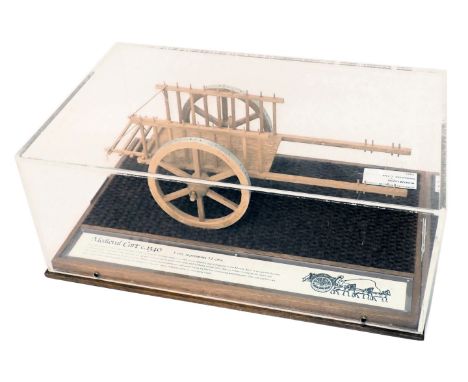 A scale model of a Medieval cart circa 1840, in glazed perspex case, 44cm wide. 