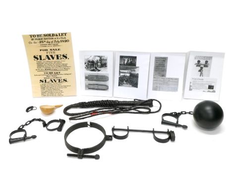 A quantity of display models relating to slavery, to include leather whip, ball and chain, handcuffs, etc. 