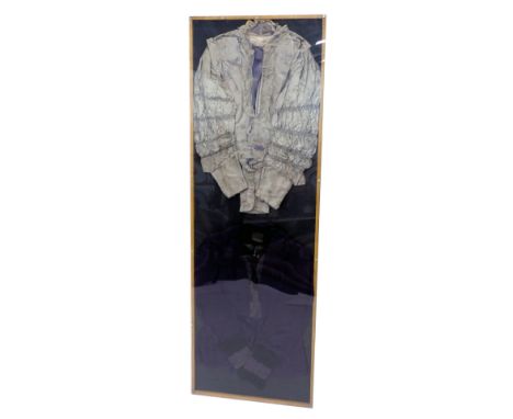A 19thC lady's grey silk and lace pleated jacket, decorated with flowers, and a satin effect silk and lace jacket, both mount