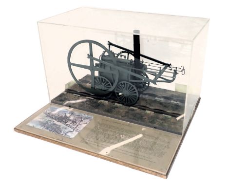 A scale model of Richard Trevithick's Tramroad locomotive, scale 1cm:12cm, seated on a track with informative display, within