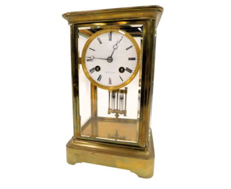 A J. H. Goulding brass cased mantel clock, of rectangular form, with circular enamel Roman numeric border, 30 hour movement, 