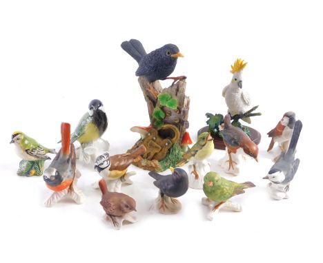 A collection of bird ceramic ornaments, comprising nine Goebel birds, a Beswick gold crest, Karl Enz bird, Country Artists Cr