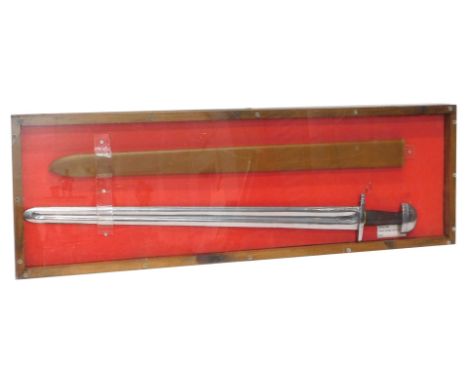 A replica Viking sword and scabbard, in perspex and pine case, 105cm x 35cm. 