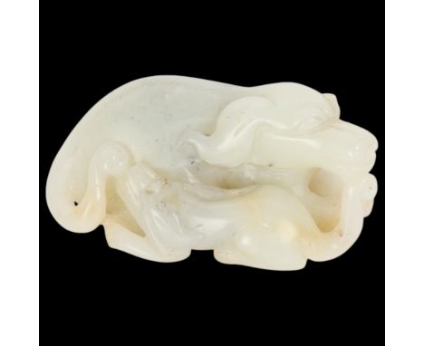A Chinese relief carved jade buffalo and calf, Qing Dynasty, length 7cm