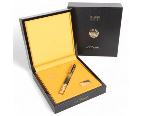 An S.T.t Dupont limited edition Shanghai ballpoint pen, no. 0115/1088, in original presentation box and outer box Pen is in g