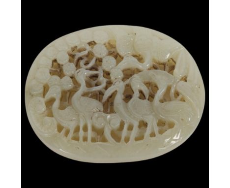A Chinese relief carved and pierced jade pendant, stork design, Qing Dynasty, 6.5cm x 5.5cm