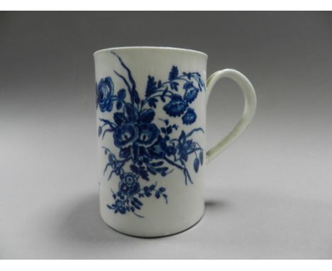 A first period Worcester porcelain mug printed in blue with botanical sprays, 12cm high