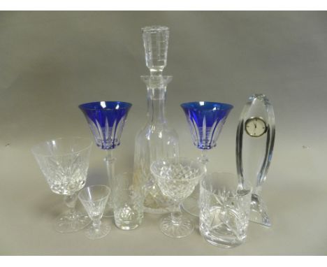 Cut glassware to include tumblers, wines, glasses and blue flashed wine glasses and a cut glass decanter and stopper