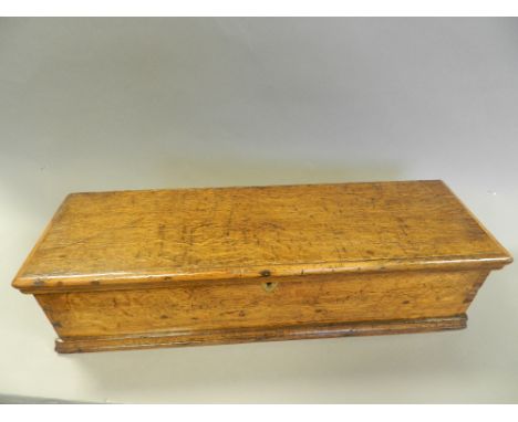 An early 20th century oak box with hinged lid and brass key escutcheon together with opalescent lamp shade and clear glass fu
