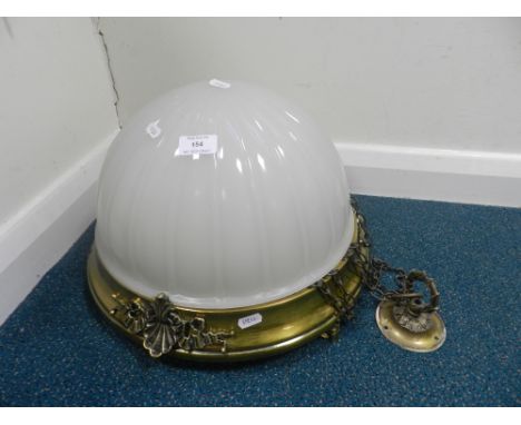 A modern brass mounted glass ceiling light applied with Neo-classical swags