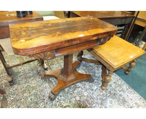 A William IV rosewood fold-over top card table with baize lined playing surface and volute scroll concave frieze raised on an