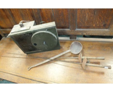 An Ilford projector box, a pair of fencing foils and a wrought iron ladle