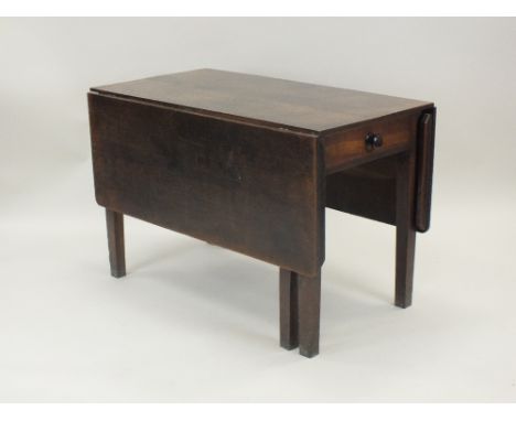 A Victorian oak drop-leaf kitchen table, second half 19th century, the rectangular flap top above a single end frieze drawer 
