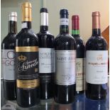 A selection of six mixed red wine