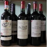A selection of six mixed red wine