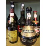 A Baileys Irish cream, Half bottle of Calvados, a Bols cherry brandy, a Drambuie and an Irish Mist