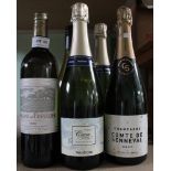 A mixed collection of six bottles of champagne, Cava & white wine