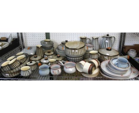 A shelf containing a&nbsp; three differing Denby pattern tea and dinner wares