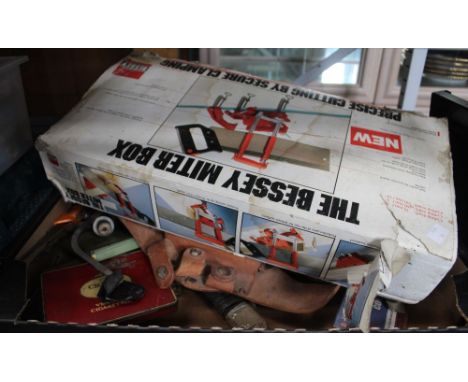 A Bosch drill in case, and two boxes of loose tools