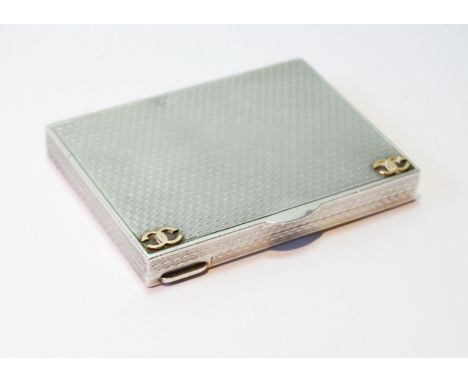 Silver rectangular compact, engine turned with applied gold initials, probably Austrian, 60mm x 80mm. 