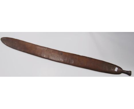 Aboriginal fish tail paddle club (Rainforest sword), with shaped grip, 147.5cm long and 13.5cm wide.CONDITION REPORT: There a
