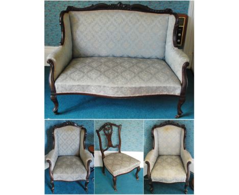 Edwardian composite carved mahogany eight piece parlour suite comprising a pair of chairs and a matching sofa, four side chai