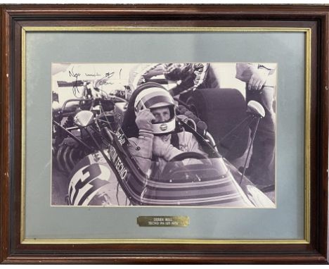 Original black and white framed photograph of Derek Bell sitting in his 1972 Techo Martini Racing Team (the first time the It