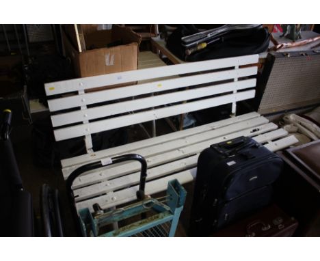 A white painted wooden and metal garden bench