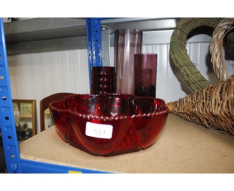 A ruby glass bowl; a similar vase and two amethyst glass vases 