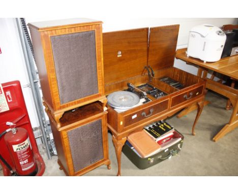 A Dynatron stereo recorder and mixer; a Garrard turntable, and a pair of matching speakers