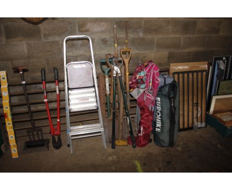 A quantity of long handled gardening tools
