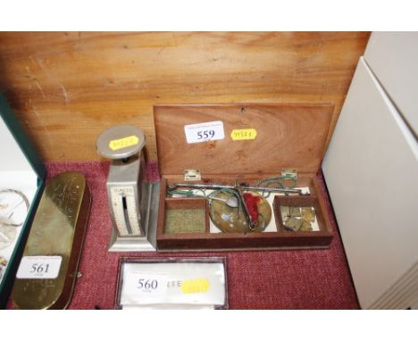 A cased set of balance scales; and one other scale