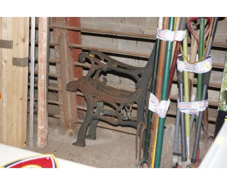 A pair of metal garden bench ends