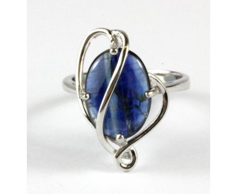 A 925 silver ring set with a large cabochon cut kyanite, (P).