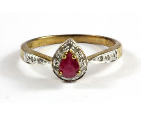 A 9ct yellow gold ruby and diamond set cluster ring, (N.5).