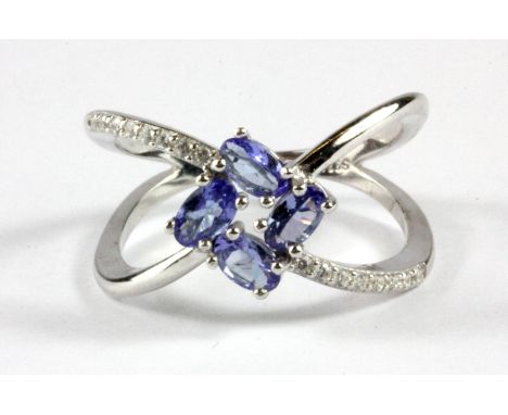 A 925 silver tanzanite set ring.