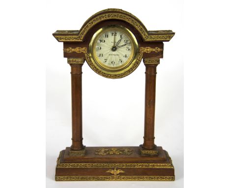 An early 20th Century gilt mounted portico clock, H. 22cm.