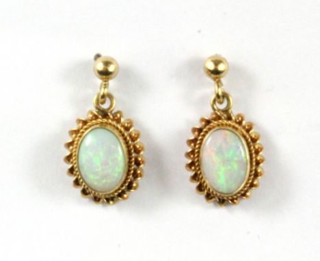 A 9ct yellow gold opal set drop earrings, L. 1.5cm.