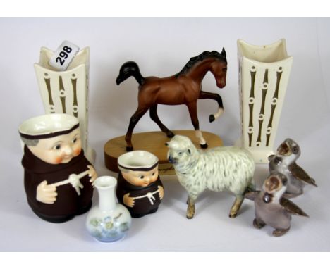 A small group of mixed ceramic items.