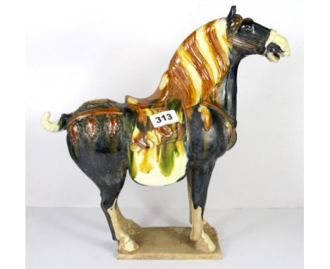A Chinese Tang dynasty style ceramic horse, H. 37cm.