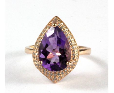 A 925 silver, rose gold gilt pear cut amethyst set ring, (P).